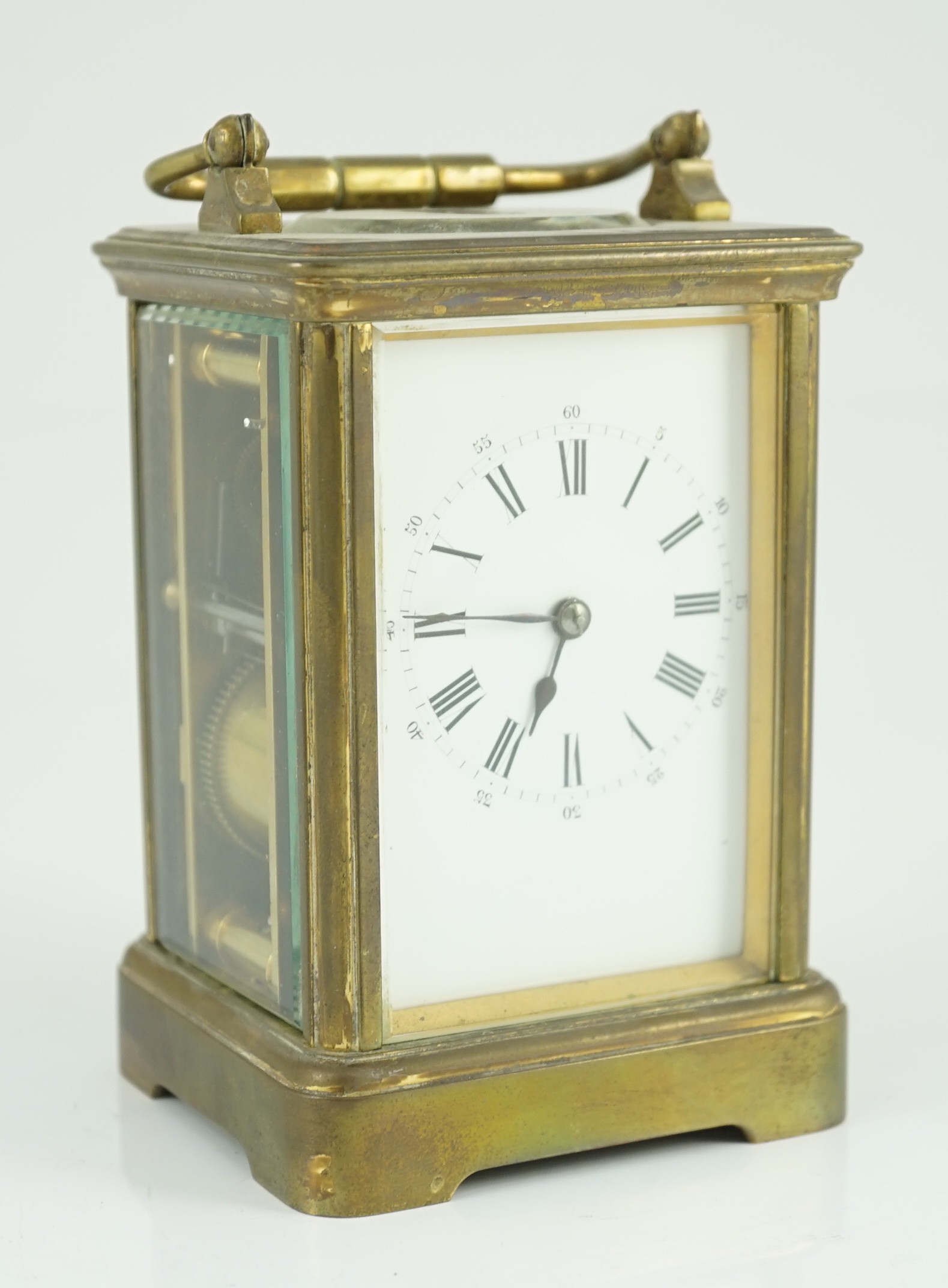 An early 20th century French brass carriage clock by Drocourt & Co. of Paris, 8.5cm wide, 7.5cm deep, 13.5cm high